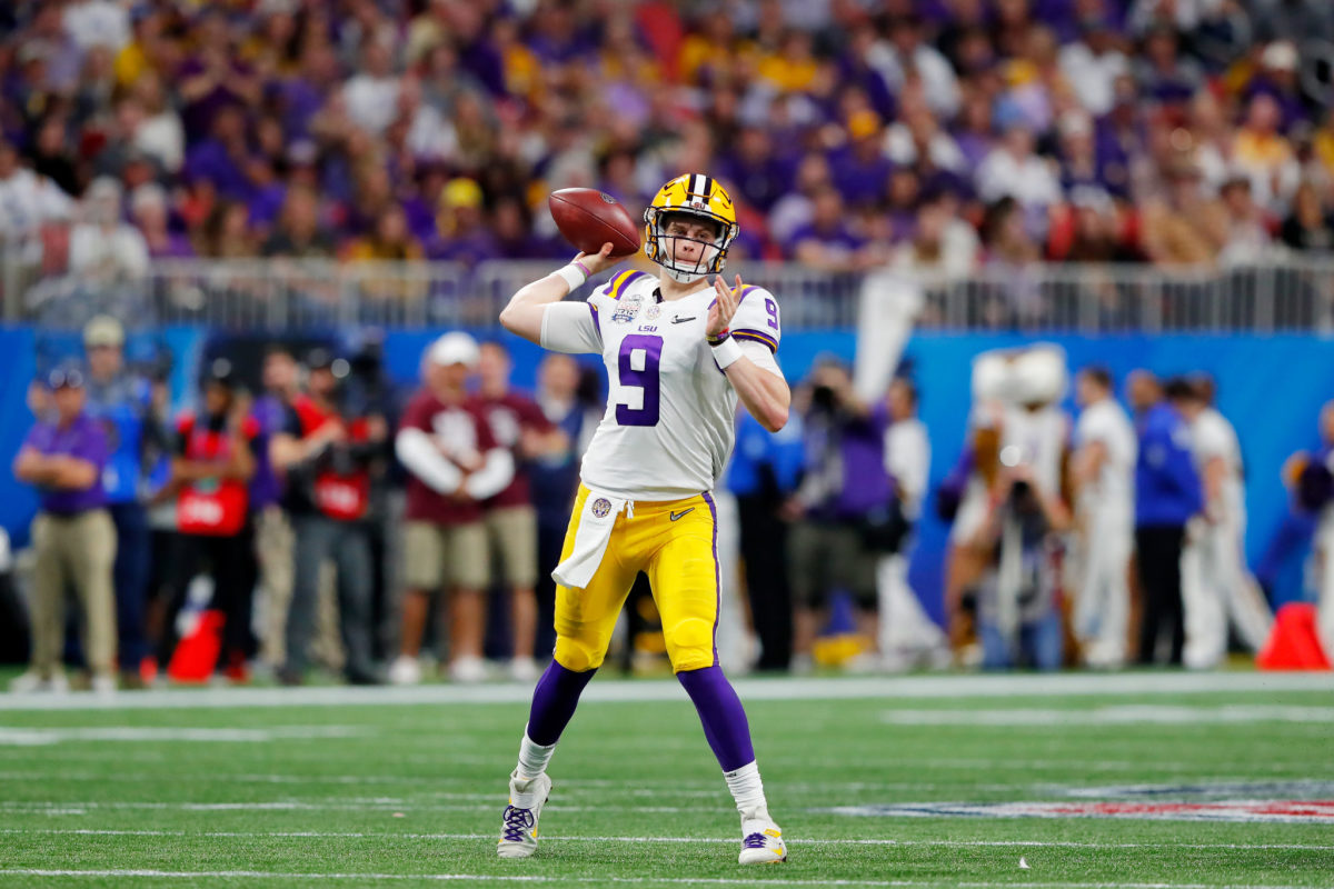 Joe Burrow throws a pass in the first half of the Peach Bowl against Oklahoma.