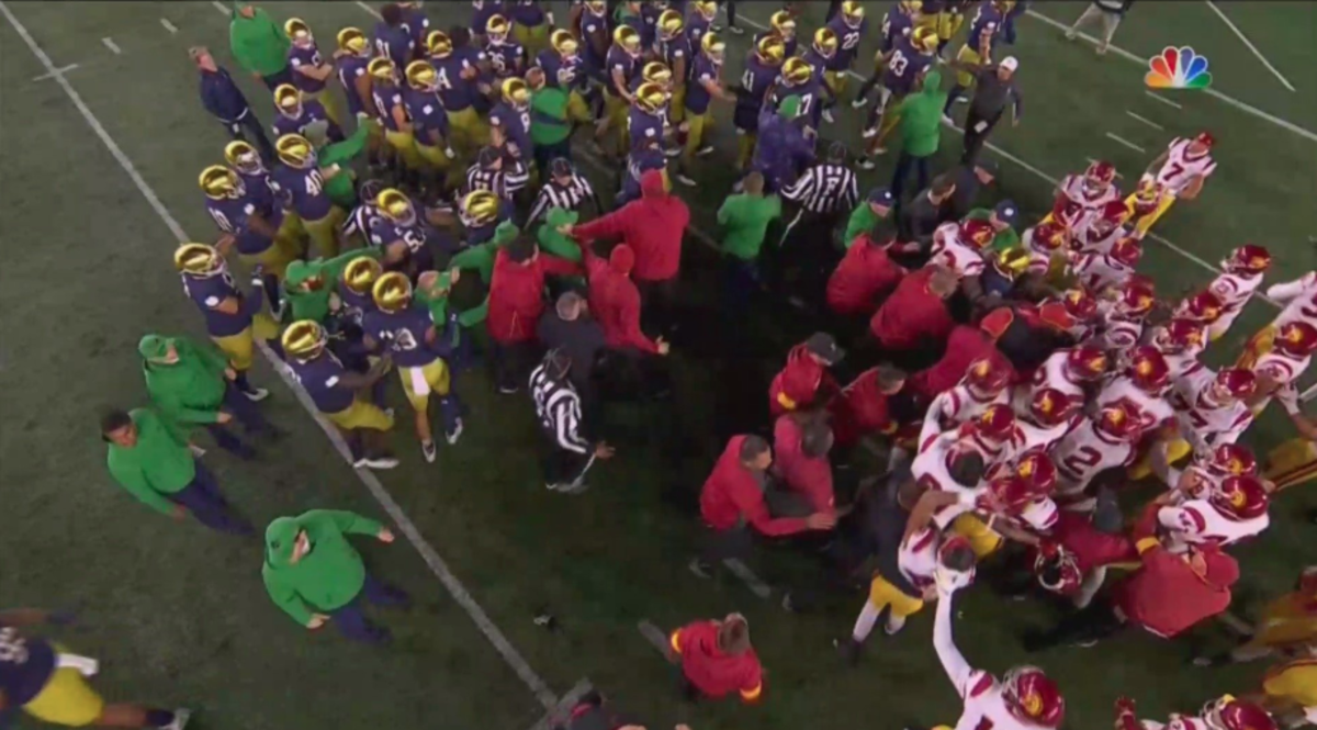 USC and Notre Dame players fight at halftime.