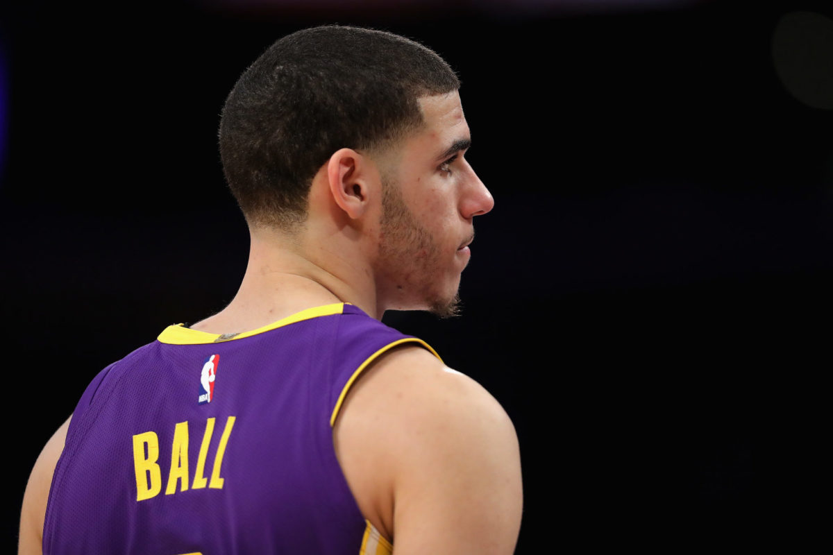 A closeup of Lonzo Ball in his purple Los Angeles Lakers uniform