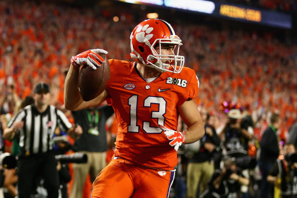 Hunter Renfrow #13 of the Clemson Tigers celebrates after scoring a 31 yard touchdown pass from Deshaun Watson #4 in the first quarter against the Alabama Crimson Tide.