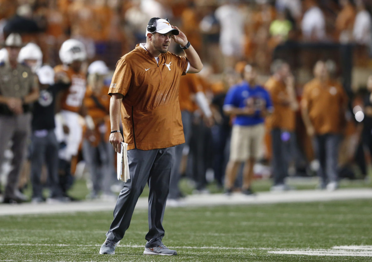 Tom Herman on the sideline during a Texas football game.