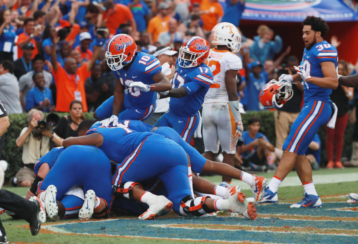 Florida Gators players celebrating a win over Tennessee.