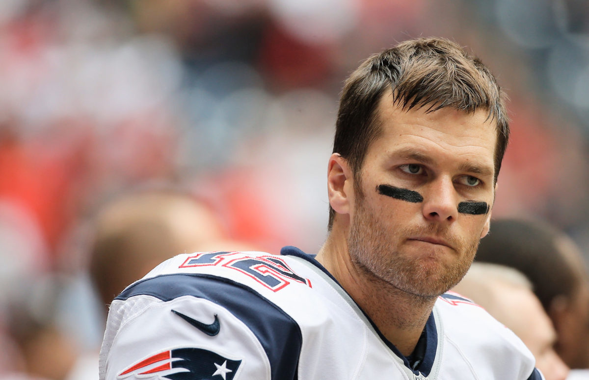 Tom Brady on the bench before a game against Houston.
