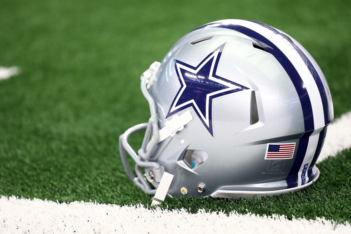 A closeup of a Dallas Cowboys helmet.