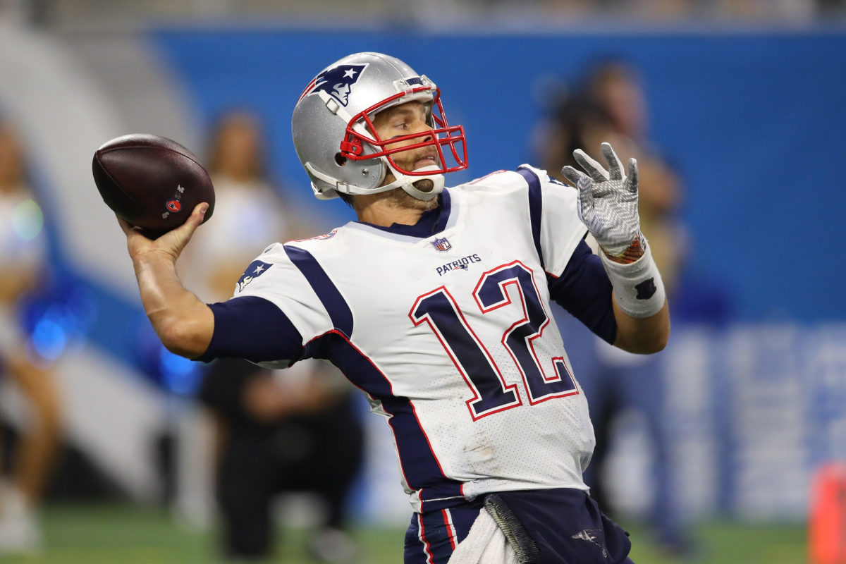 Tom Brady throws a pass against the Detroit Lions.