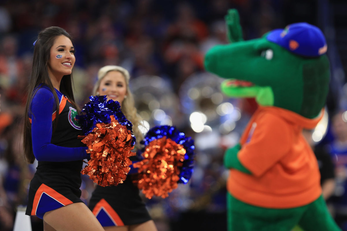A closeup of a Florida Gators cheerleader during a basketball game.