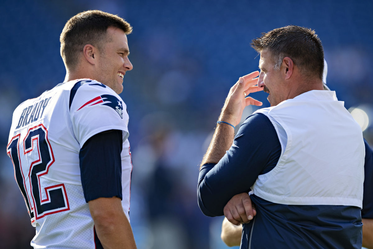 Tom Brady and Mike Vrabel talk before a Patriots-Titans game.
