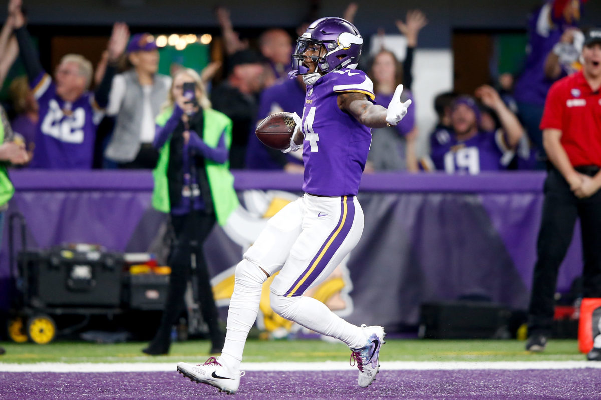 Minnesota Vikings wide receiver Stefon Diggs rushes with the ball against  the New Orleans Saints in the second half of the NFC Divisional round  playoff game at U.S. Bank Stadium in Minneapolis