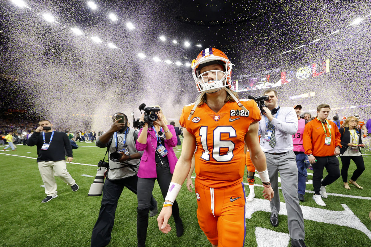 Clemson QB Trevor Lawrence walks off the field after the college football playoff national title.