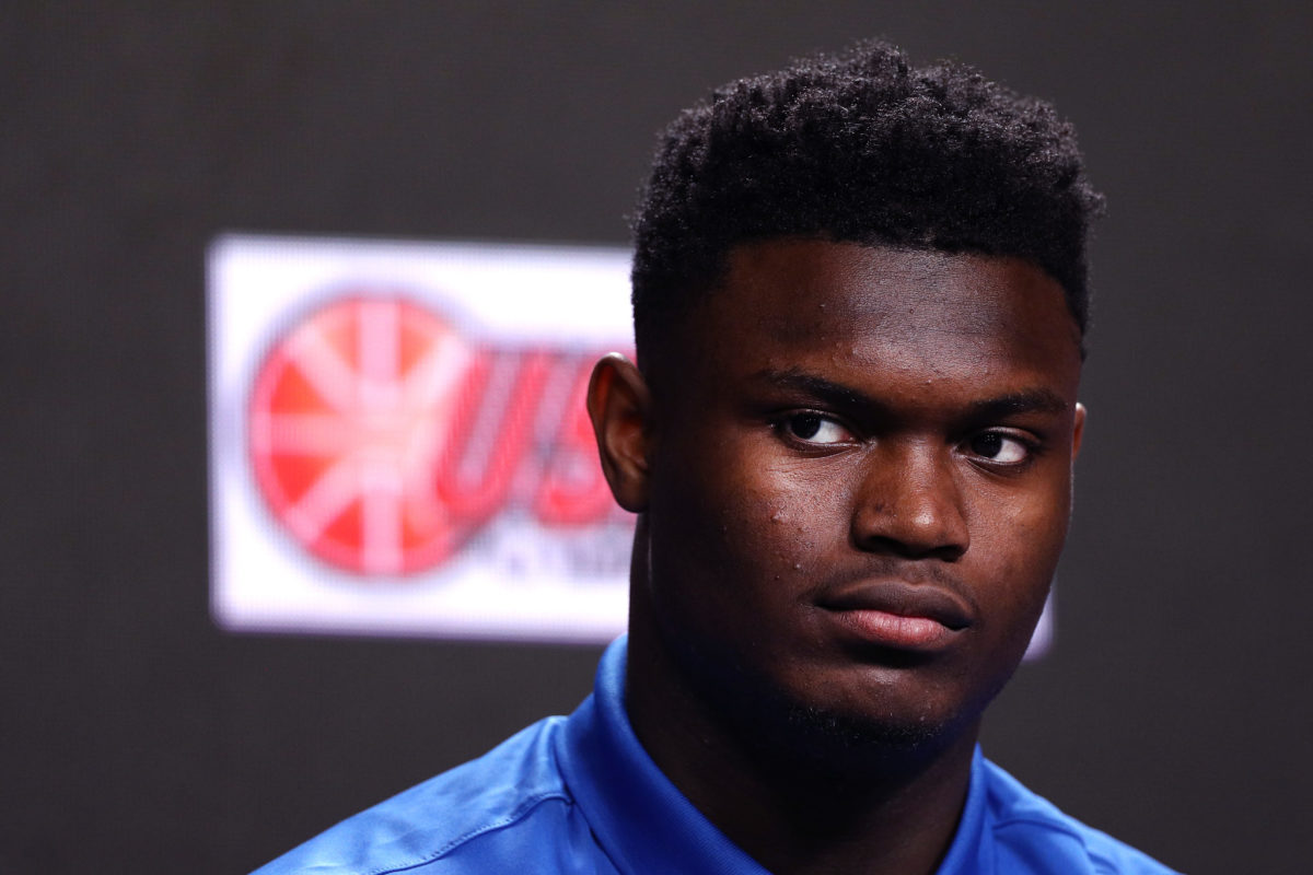 A closeup of Zion Williamson talking to the media.