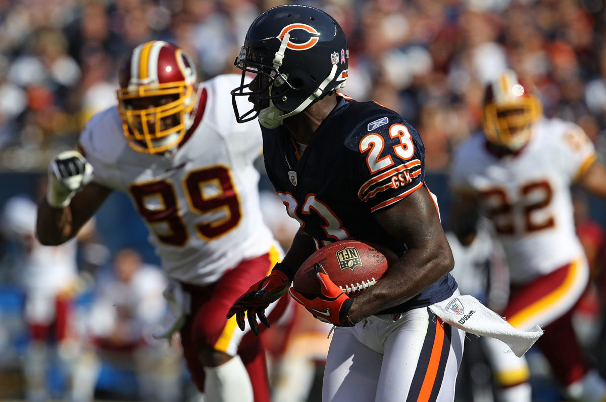 Devin Hester running with the football.