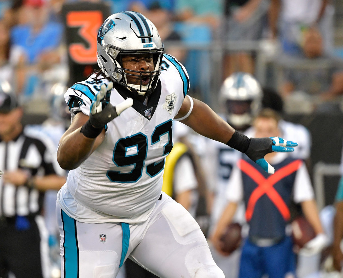 Carolina Panthers defensive lineman Gerald McCoy mid-play in a game.