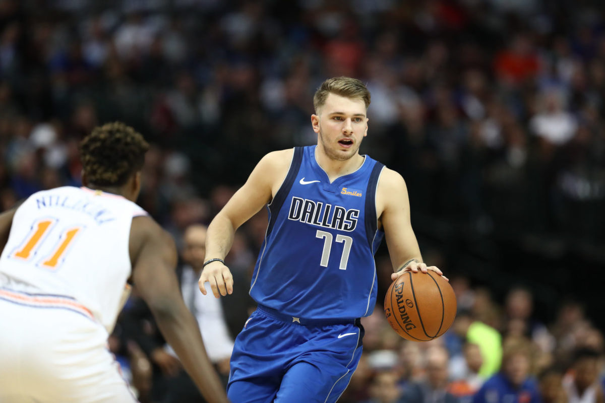 Luka Doncic handling the ball during a game.