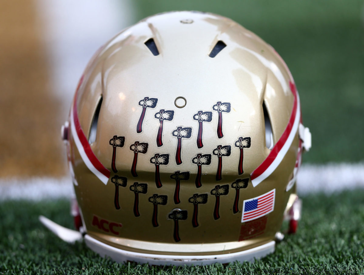 A closeup of a Florida State Seminoles football helmet.