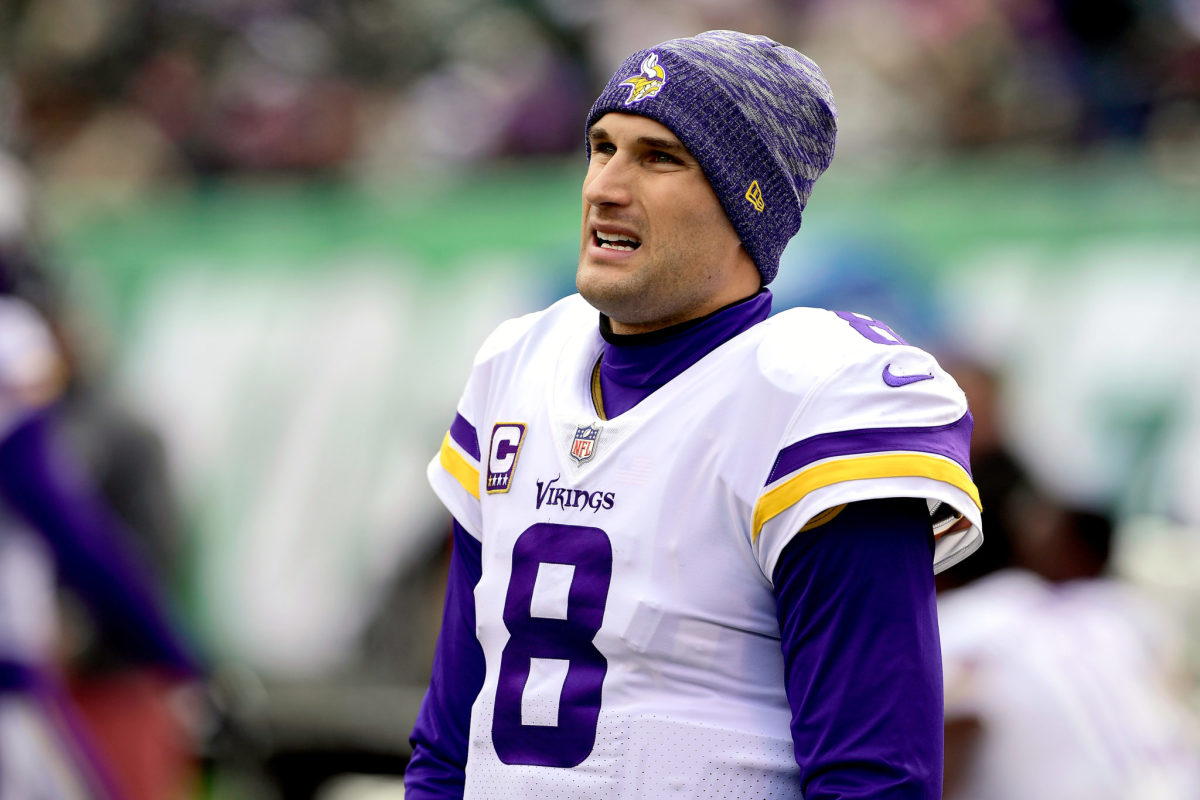 Minnesota Vikings quarterback kirk cousins warms up before a game in new york