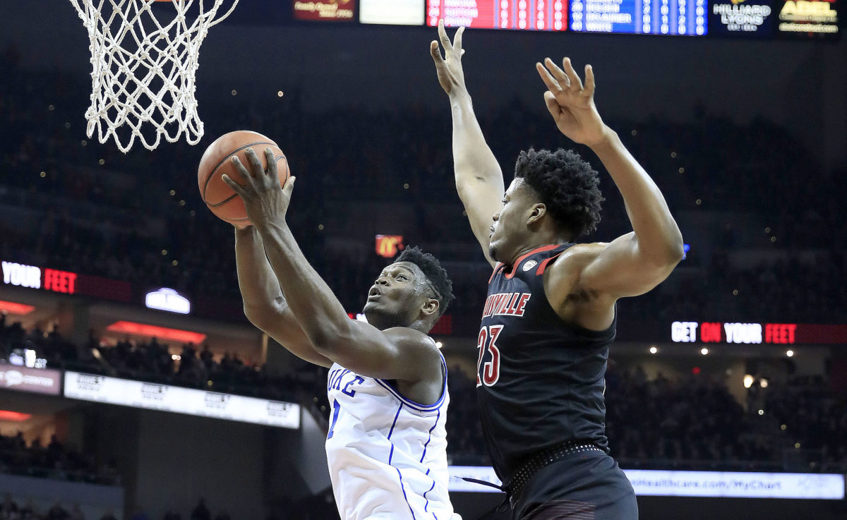 LOUISVILLE, KENTUCKY - FEBRUARY 12:   Zion Williamson #1 of the Duke Blue Devils shoots the ball against the Louisville Cardinals at KFC YUM! Center on February 12, 2019 in Louisville, Kentucky. (Photo by Andy Lyons/Getty Images)