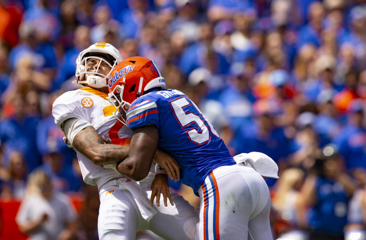 Florida defensive end Jonathan Greenard hits Tennessee quarterback Jarrett Guarantano.