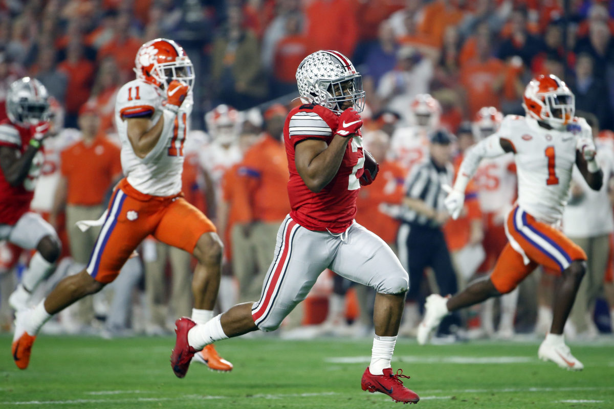 Ohio State running back JK Dobbins runs for a touchdown during the College Football Playoff against Clemson.