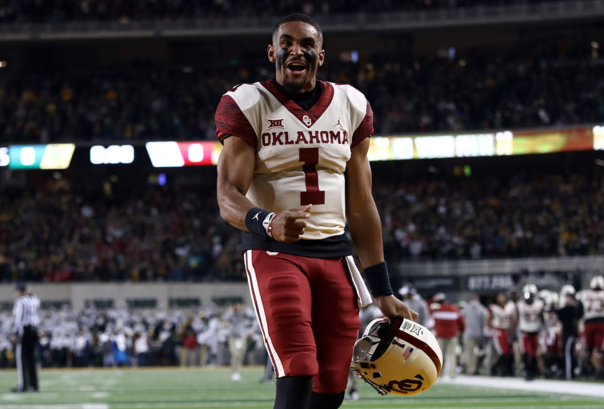 College football star Jalen Hurts celebrates Oklahoma's win against Baylor on Saturday night.