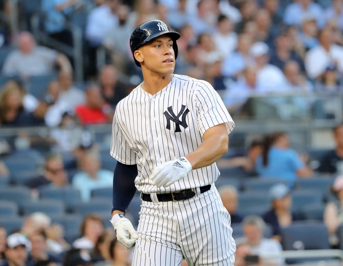 Aaron Judge hits a ball for the Yankees.