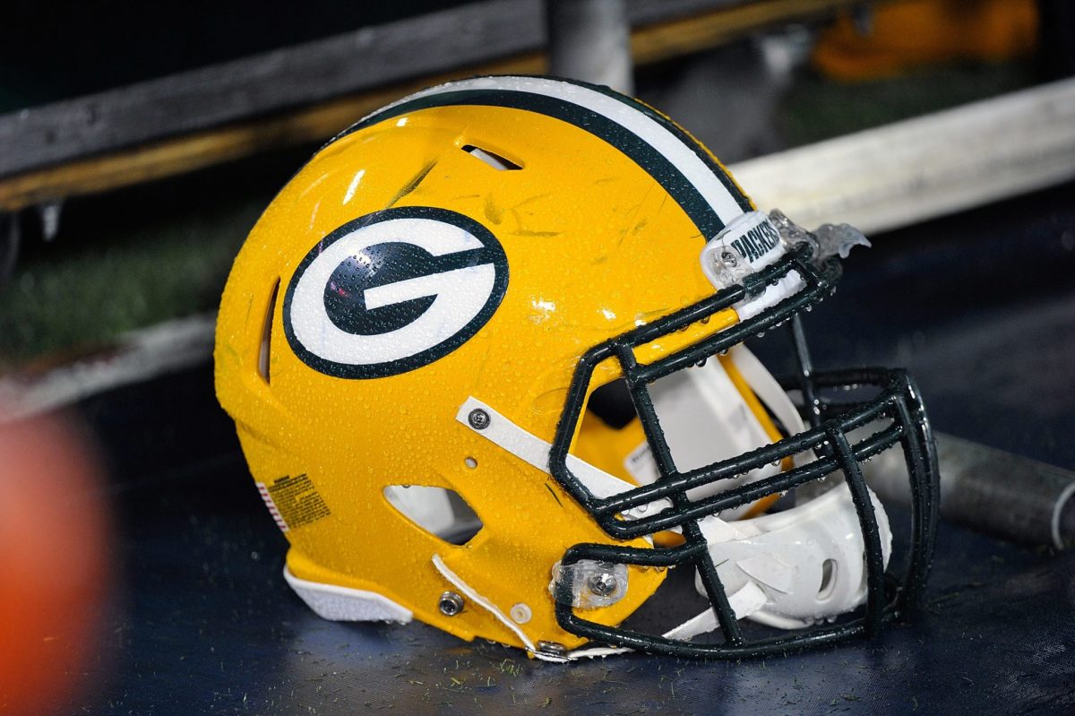 A closeup of a Green Bay Packers helmet.