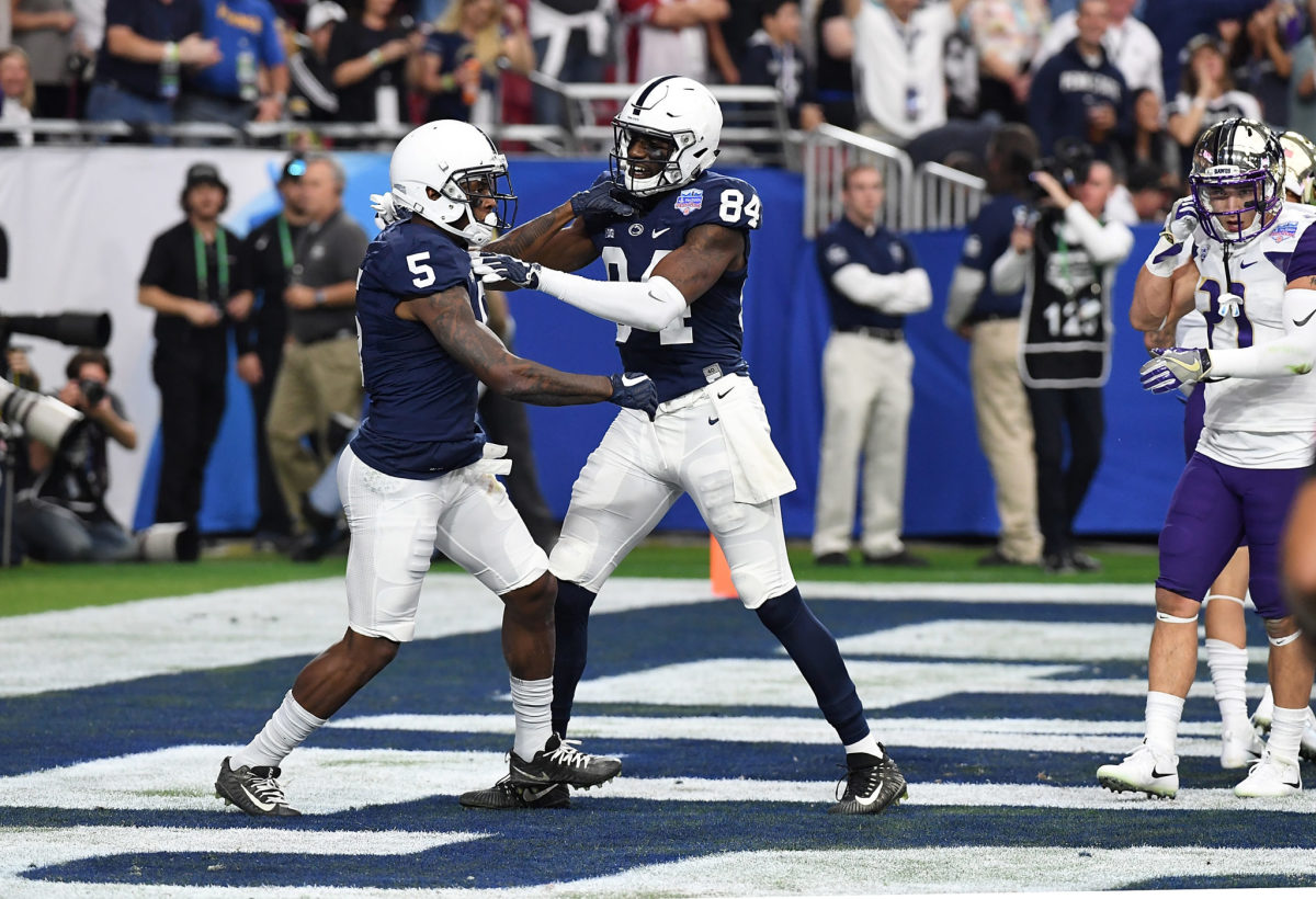 Juwan Johnson and DaeSean Hamilton celebrate a Penn State touchdown.