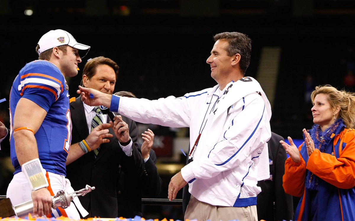 Urban Meyer celebrating with Tim Tebow after the Sugar Bowl