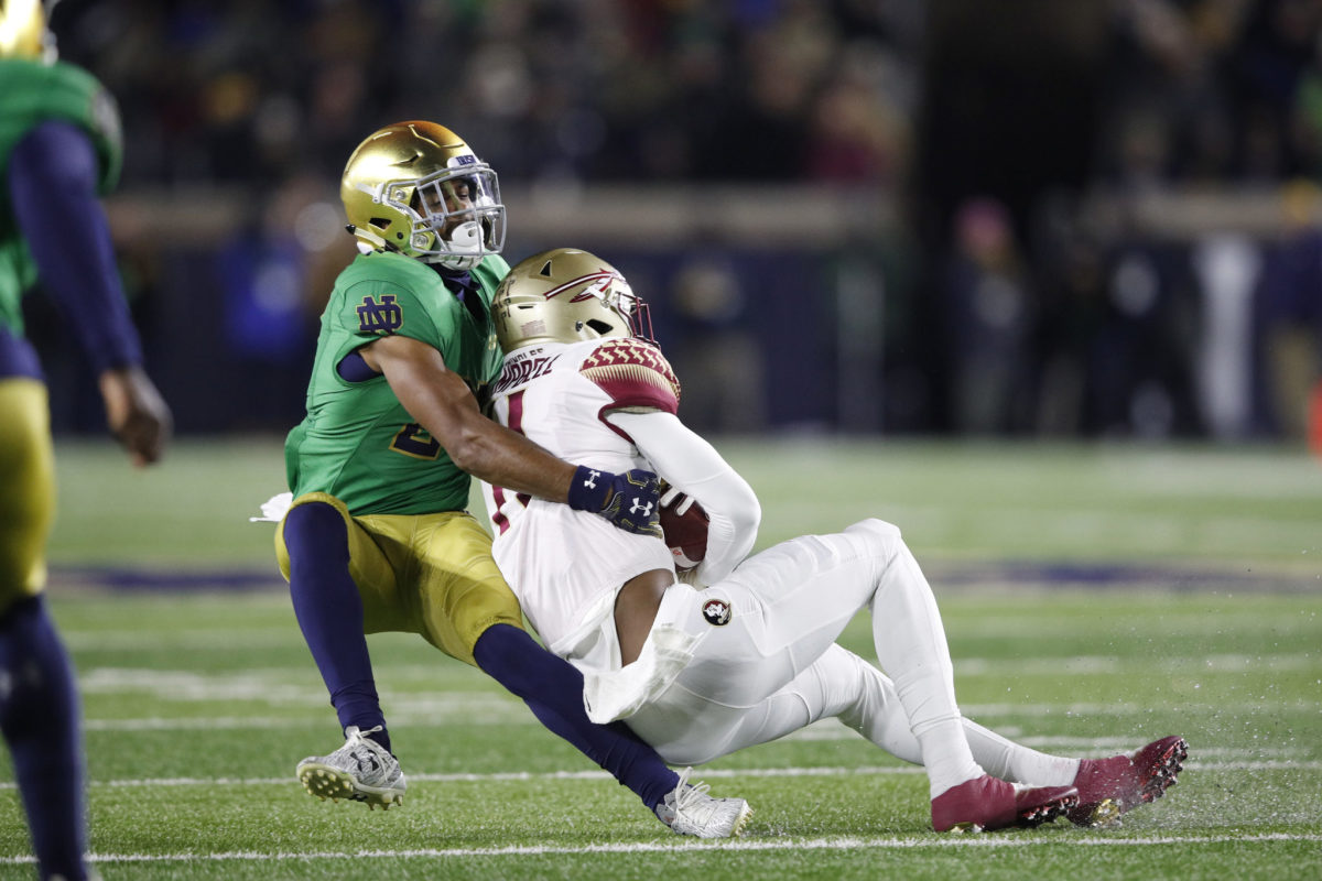 Julian Love makes a tackle for Notre Dame in a win over Florida State.