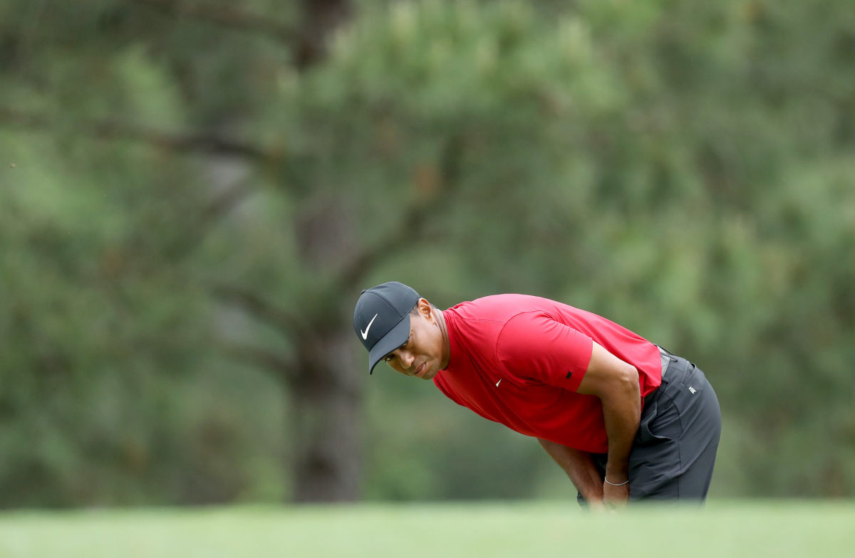 Tiger Woods reacting to a missed putt at The Masters.
