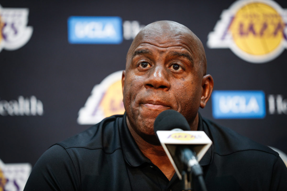 A closeup of Los Angeles Lakers great Magic Johnson addressing the media.