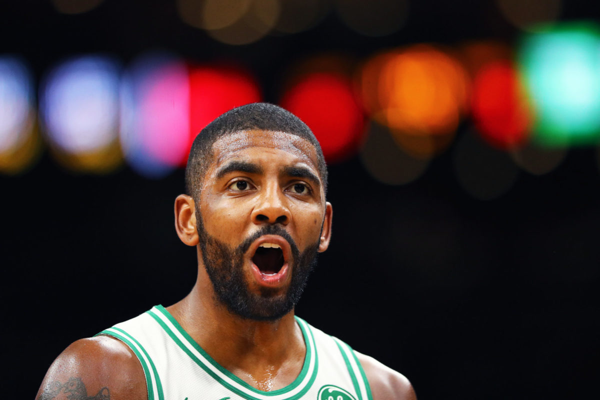 Kyrie Irving reacting to a call during a game.