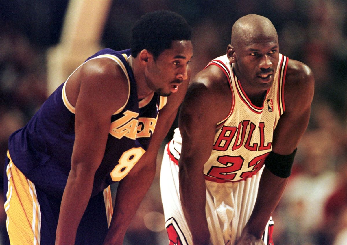 Kobe Bryant and Michael Jordan share the floor together.
