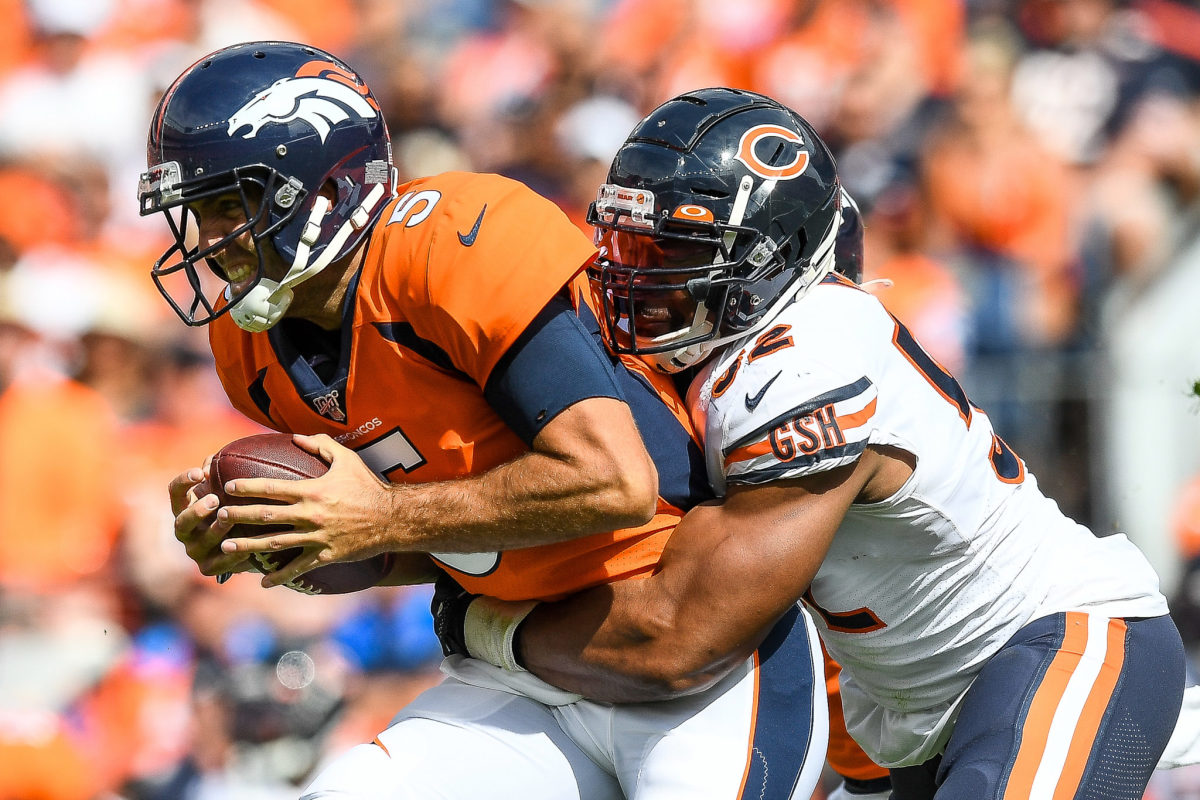 Joe Flacco is sacked during a game against the Chicago Bears.