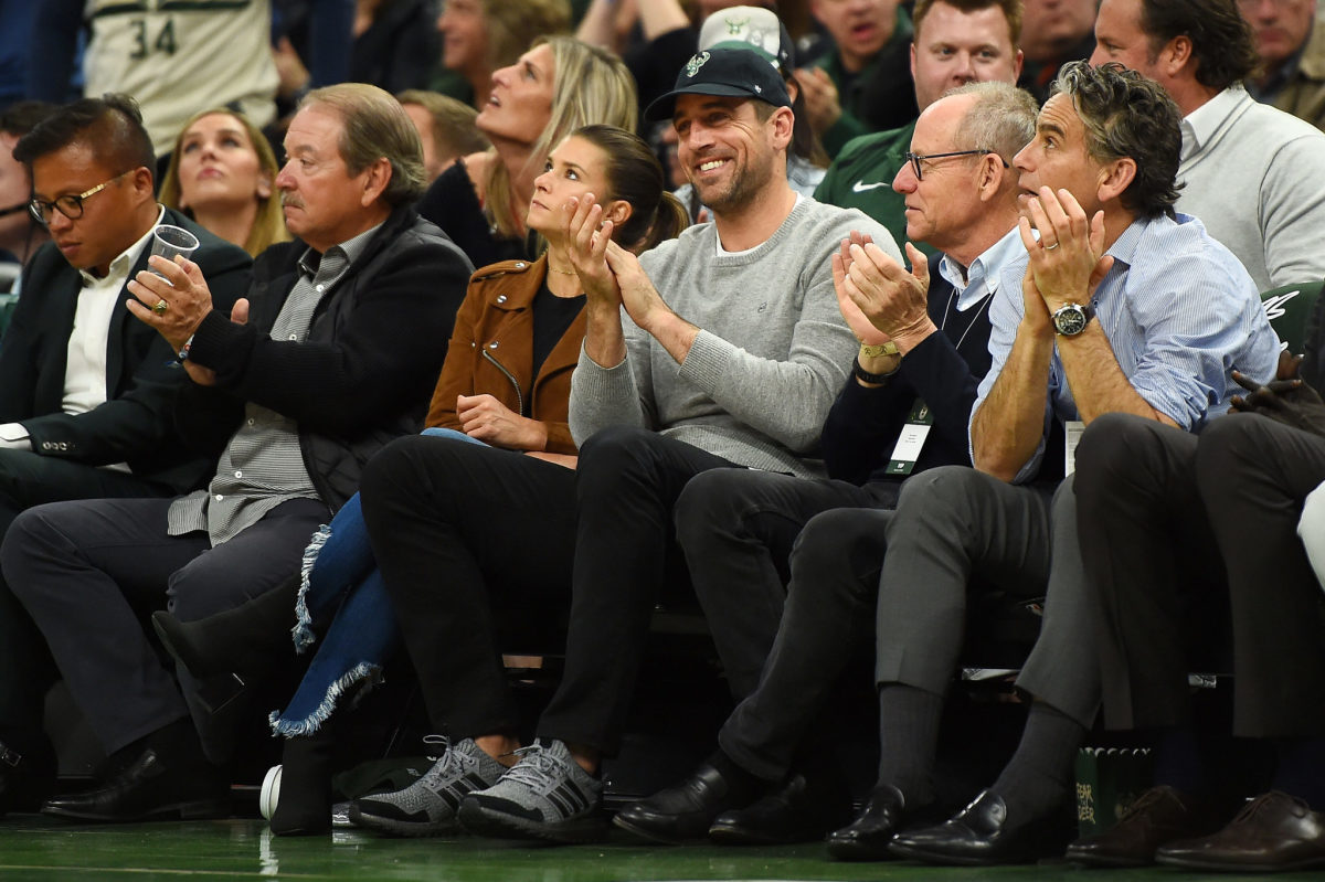 aaron rodgers and danica patrick at the bucks-celtics game
