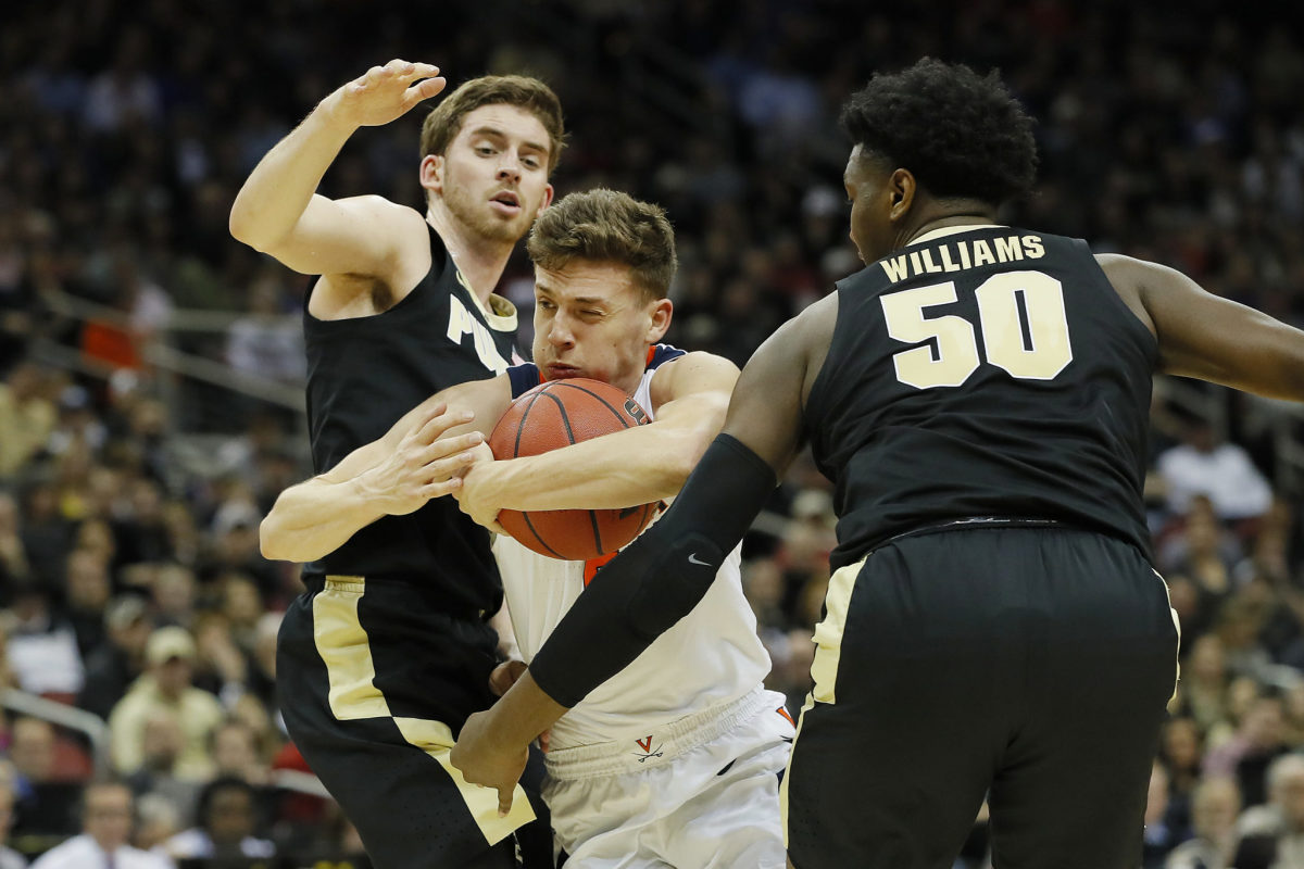 Kyle Guy for Virginia takes on Purdue.
