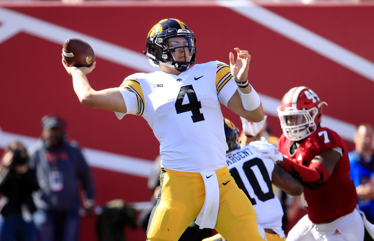 Nate Stanley throws a pass for the Iowa Hawkeyes.