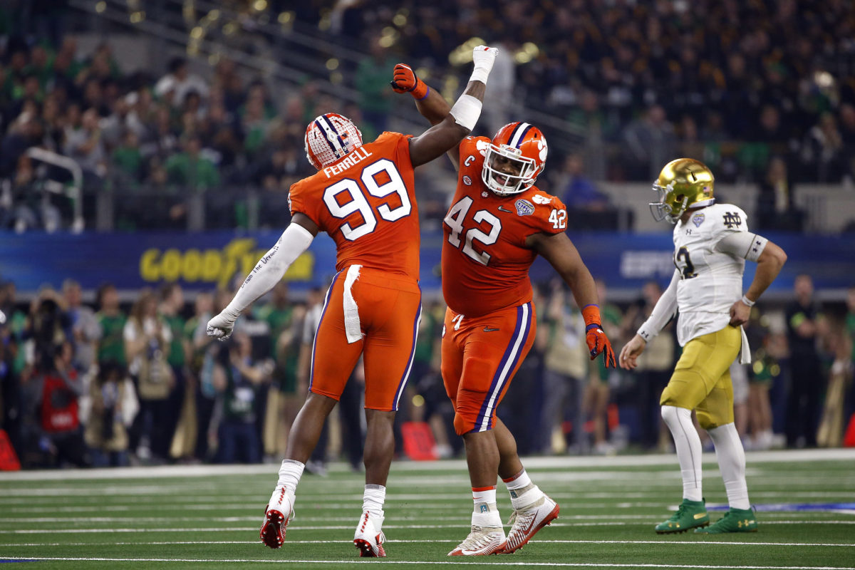Clemson defensive lineman Clelil Ferrell and Christian Wilkins celebrate a sack against Notre Dame.