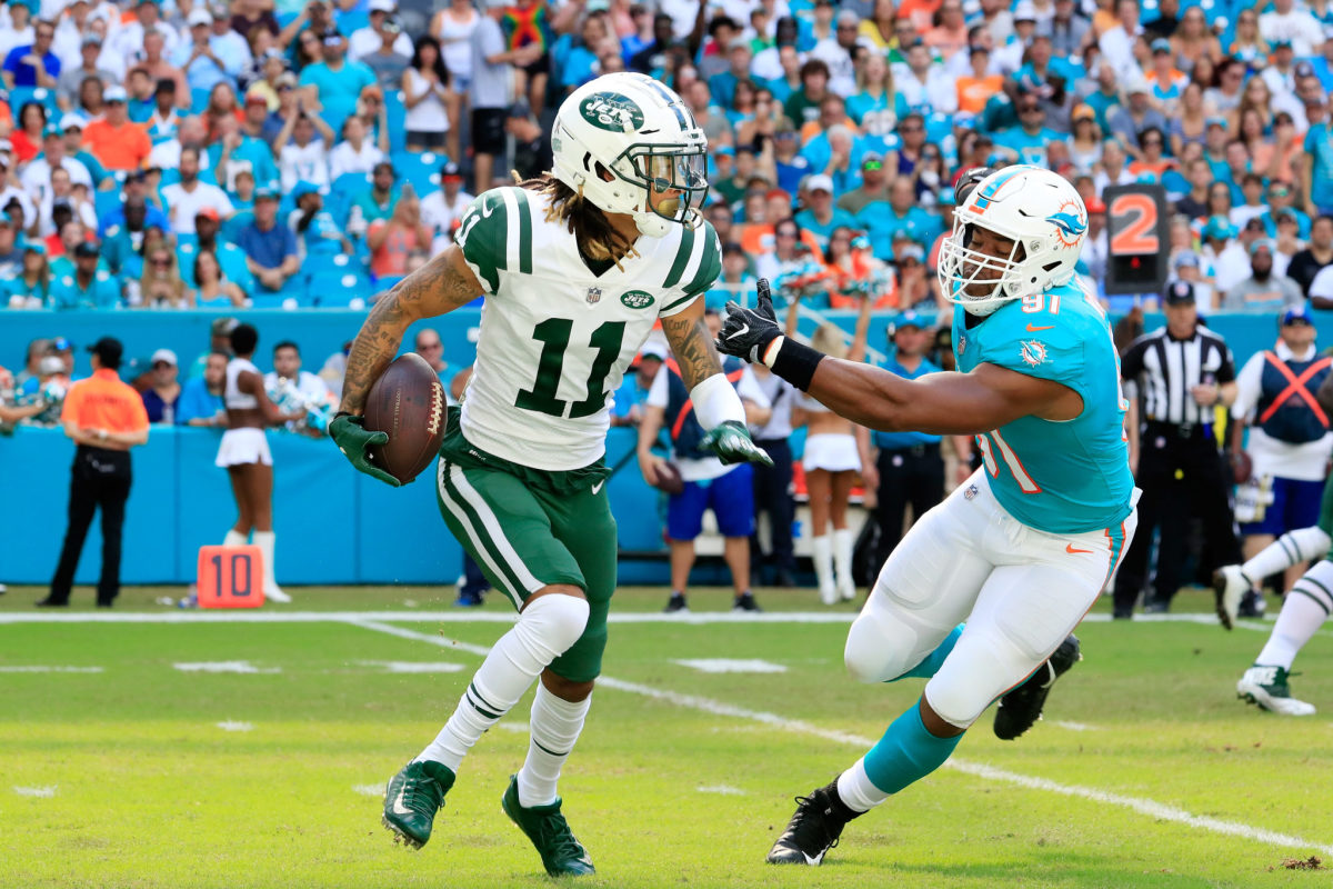 New York Jets WR Robby Anderson running with the football.