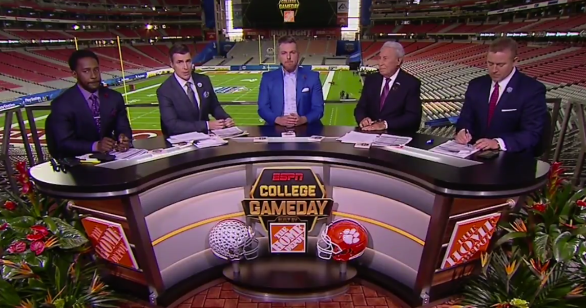 College GameDay's staff honors Edward Aschoff with flower lapels.