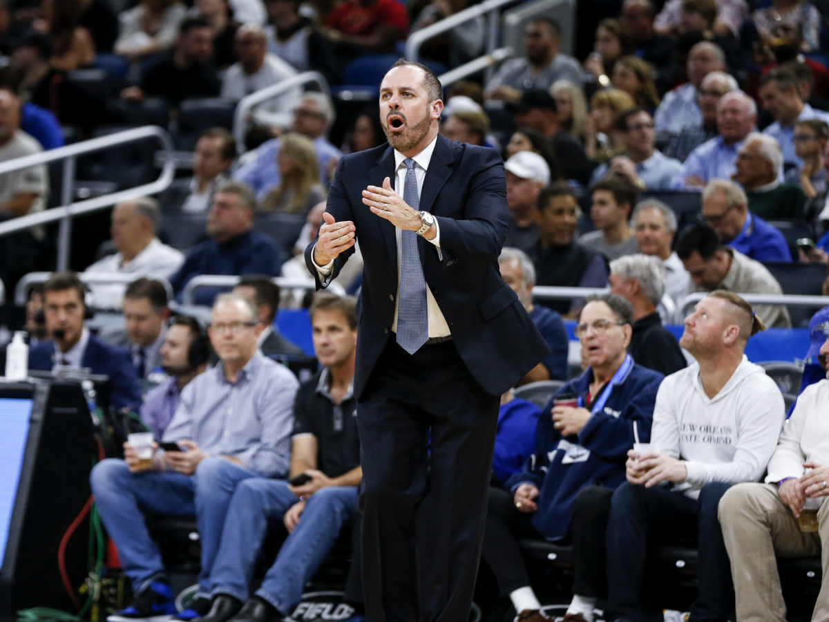 Frank Vogel calls a timeout during a Magic-Cavaliers game.