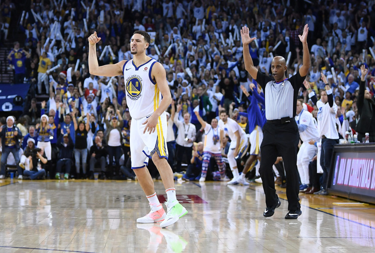 Klay Thompson reacting to a made three-point shot