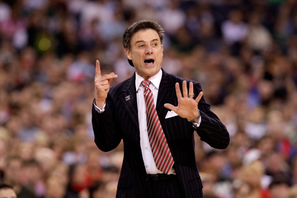 Rick Pitino makes a funny face as he coaches against Arizona.