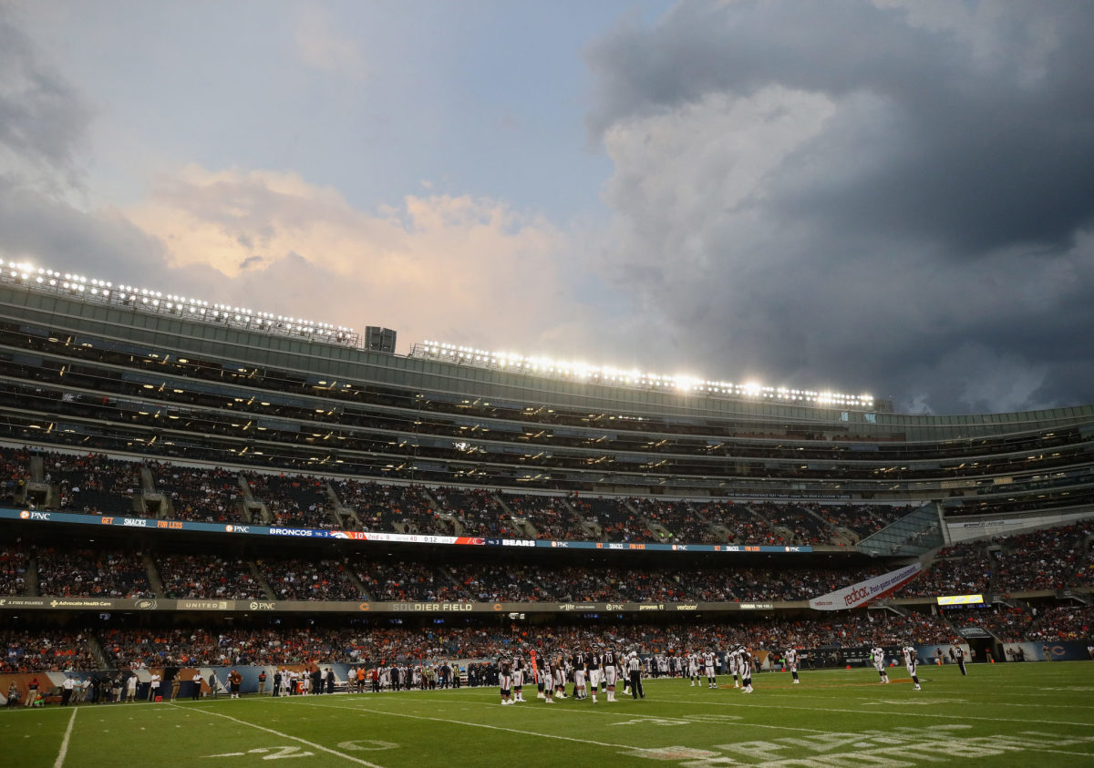 A picture of cloudy sky at an NFL game.