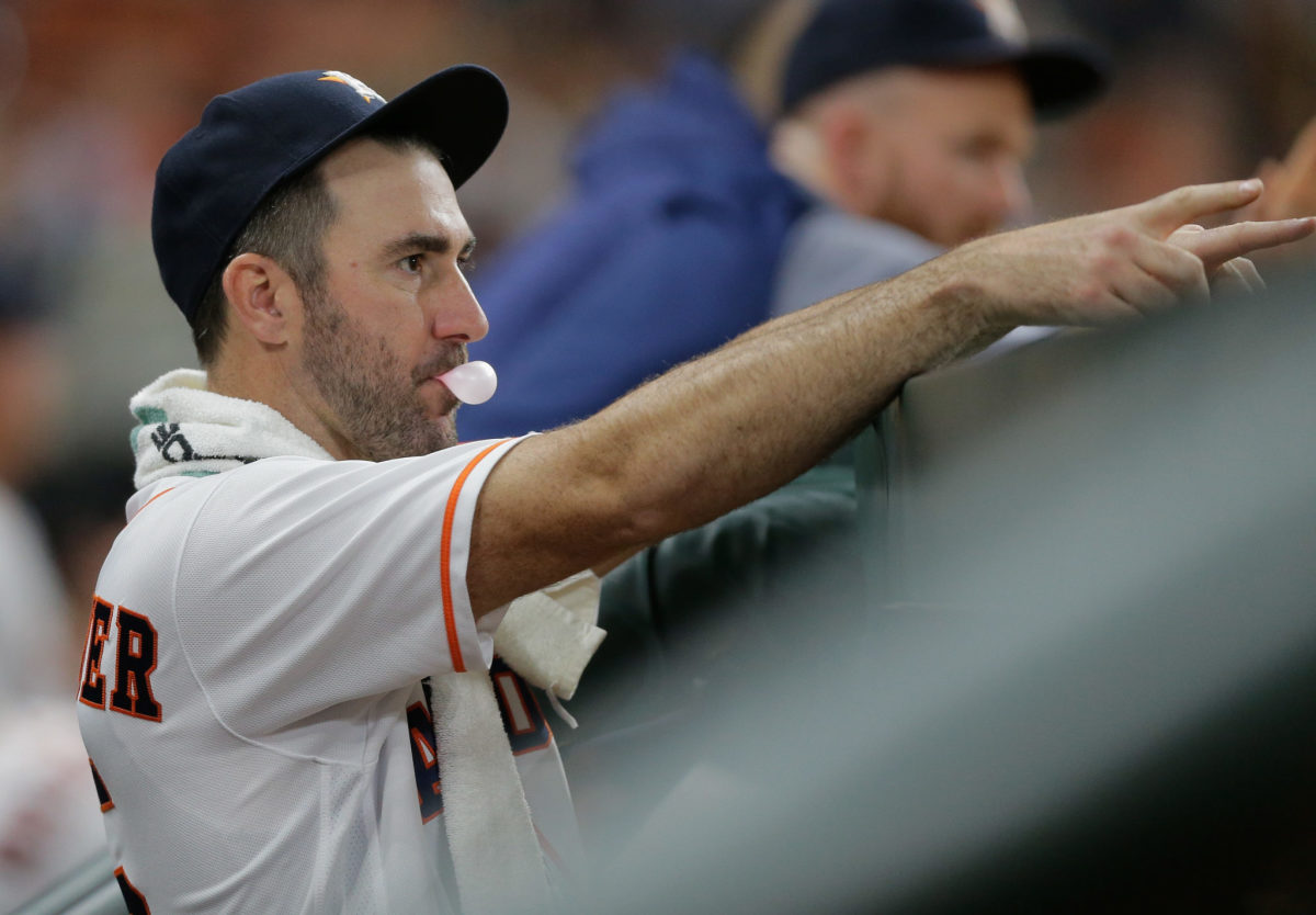 Justin Verlander blowing a bubble with his gum.