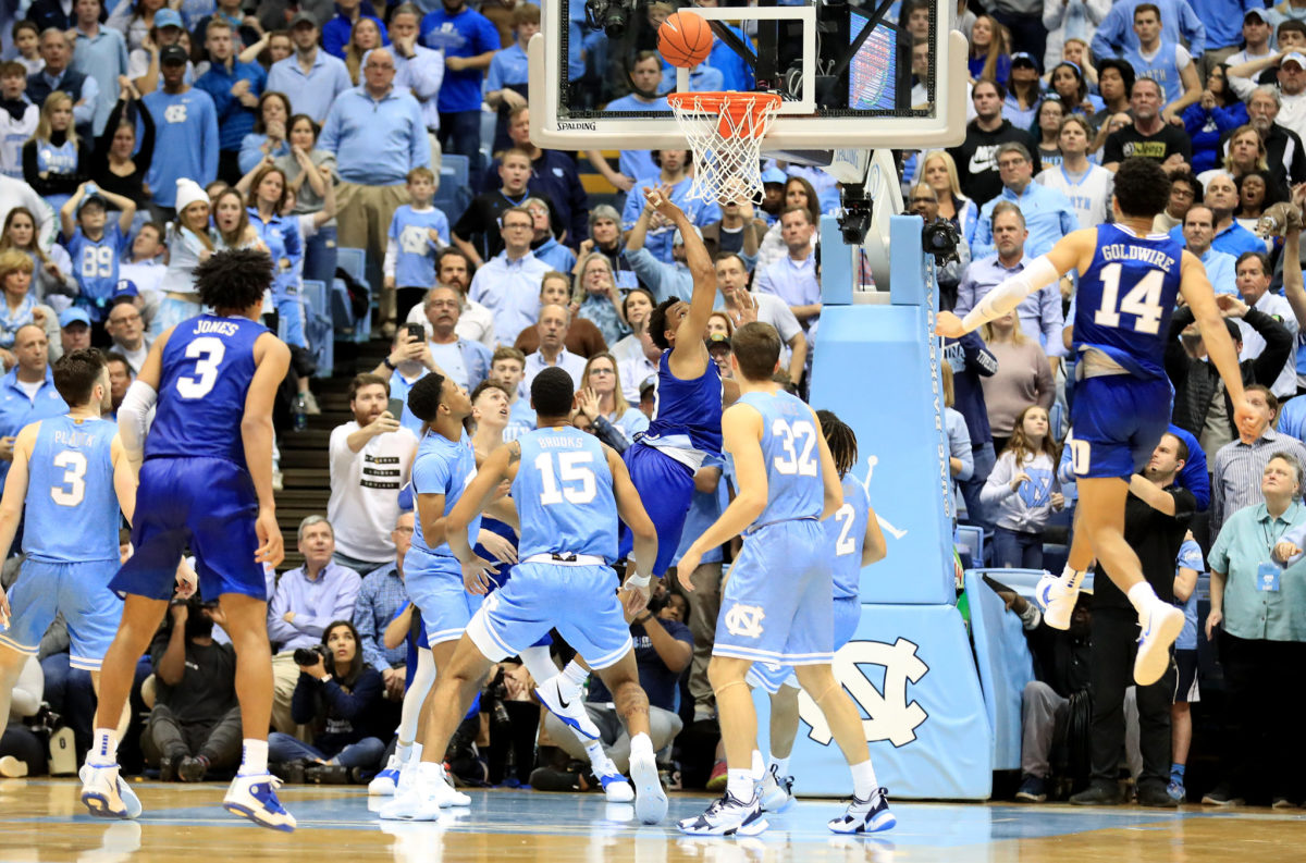 Wendell Moore taps in a game-winning buzzer beater for Duke at UNC.