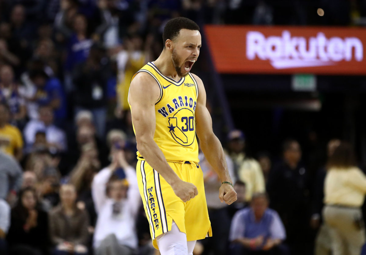 Stephen Curry celebrating during a game.