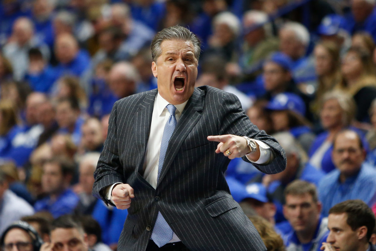 Coach Cal yelling from the Kentucky sideline.