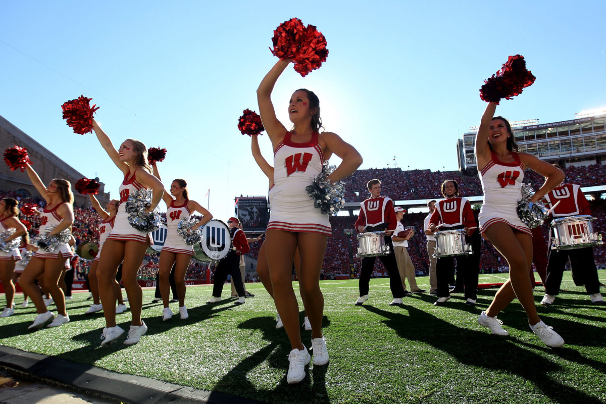 Wisconsin's cheerleaders get excited for a Badgers football game.