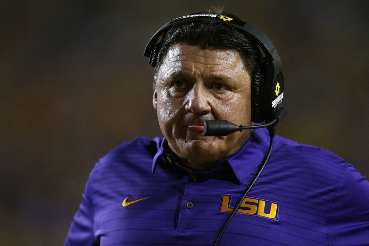 Ed Orgeron looks on intensely during a game against LSU.