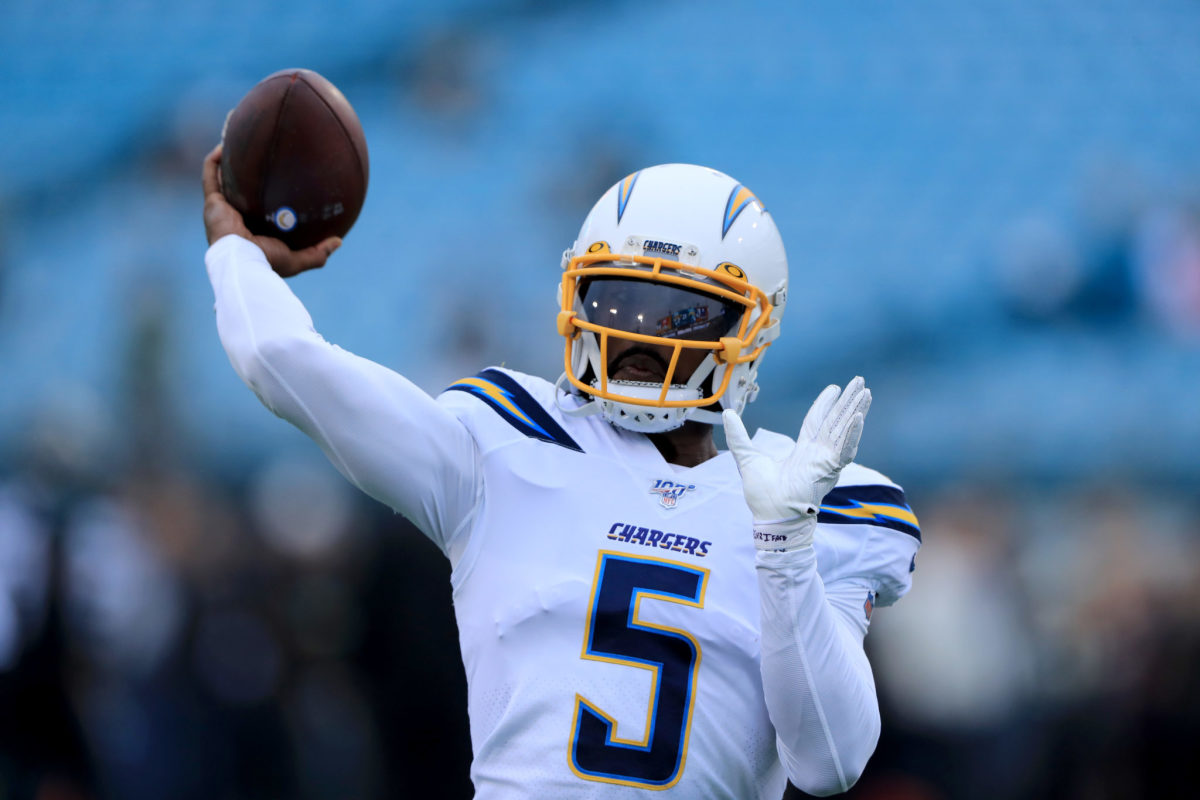 Tyrod Taylor warms up before a Chargers game.